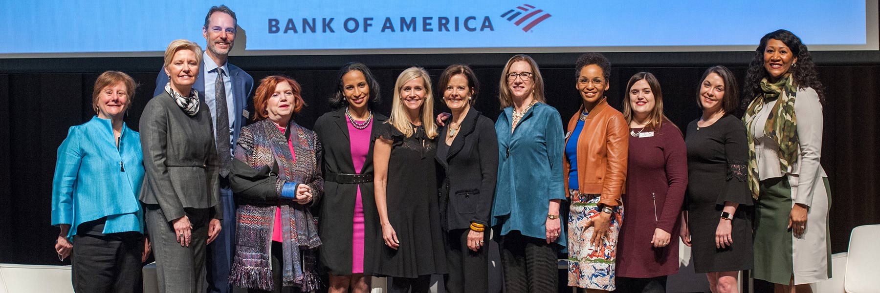 Members of the Women's Philanthropy Institute Council 2019 pose for a portrait on a stage