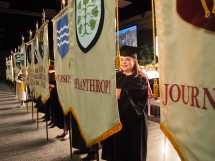 Andrea Groner, B.A. student, stands by our heraldic philanthropy banner